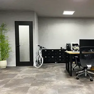 office space with a bike next to the door