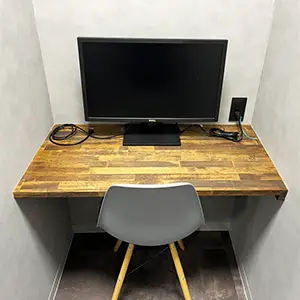 meeting room for 1 person with a desk and monitor