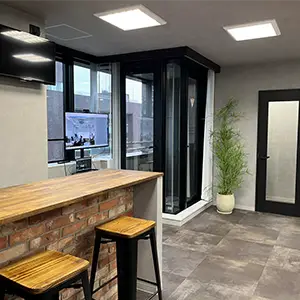 office space showing half a counter with stools